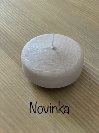 Svíčka šedá, plovoucí čočka