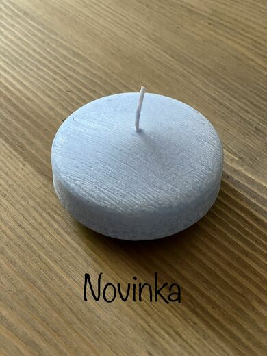 Svíčka světle modrá, plovoucí čočka